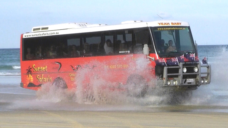 Austin Powers the 4WD Bus crossing a creek - Fraser Island